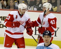 Darren Helm and Pavel Datsyuk of the Detroit Red Wings.