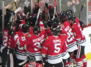 Hawks Players mob each other after a big win (photo property of Pam Rodriguez)