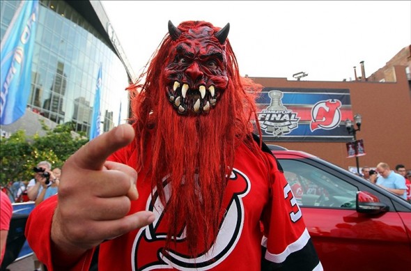 Not all Devils fans dress like this guy, but they are all passionate. (Ed Mulholland-US PRESSWIRE)