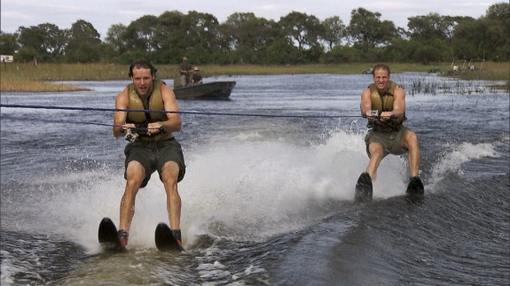 Hockey brothers Bates (left) and Anthony (right) water ski in crocodile infested waters. (CBS ©2013 CBS Broadcasting, Inc. All Rights Reserved.)
