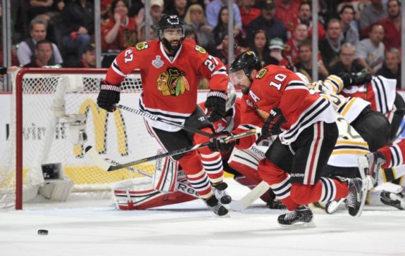 Johnny Oduya defends during the 2013 Stanley Cup Finals. (Rob Grabowski-USA TODAY Sports)