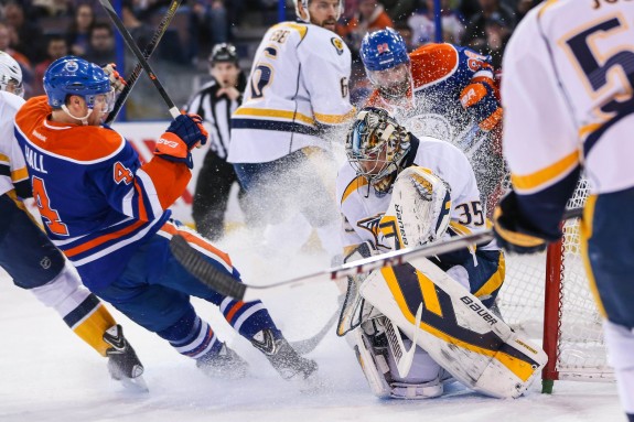 (Sergei Belski-USA TODAY Sports) Nashville Predators goaltender Pekka Rinne, seen here making a save on Taylor Hall of the Edmonton Oilers last March, has been arguably the NHL's top netminder through 20 games this season after being limited to just 24 games (and below-average statistics) all of last season.