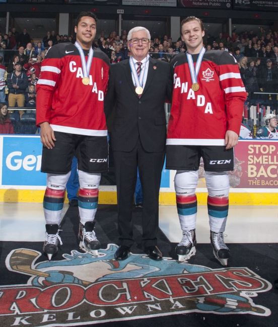 (Marissa Baecker/www.shootthebreeze.ca) Madison Bowey, left, and Josh Morrissey, right, pose with Kelowna Rockets general manager Bruce Hamilton upon returning to the WHL club with gold medals from the world juniors.