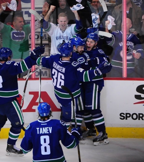 Bo Horvat celebrates his goal against the Calgary Flames in the opening game of their first round series. (Anne-Marie Sorvin-USA TODAY Sports)