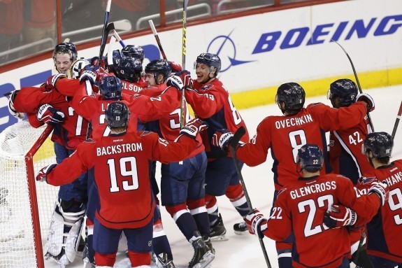 The Washington Capitals celebrate after defeating the New York Islanders in game seven at the Verizon Center. (Geoff Burke-USA TODAY Sports)