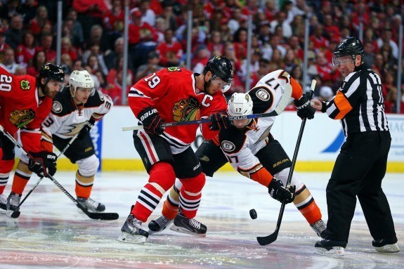 Chicago Blackhawks center Jonathan Toews (19) and Anaheim Ducks center Ryan Kesler (17) battle for the starting face-off during the first period in game four of the Western Conference Final of the 2015 Stanley Cup Playoffs at United Center.(Dennis Wierzbicki-USA TODAY Sports)