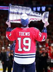 Jonathan Toews is arguably the best all-around player in the NHL, and he would easily crack an all-captain NHL team. (Dennis Wierzbicki-USA TODAY Sports)
