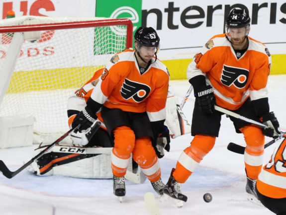 Shayne Gostisbehere and Sean Couturier (Amy Irvin / The Hockey Writers)