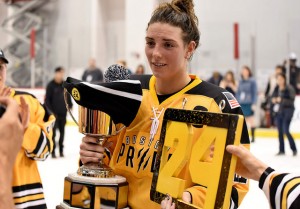 Hilary Knight of the Boston Pride holds the Isobel Cup and Denna Laing's no. 24. (Photo Credit: Troy Parla) 