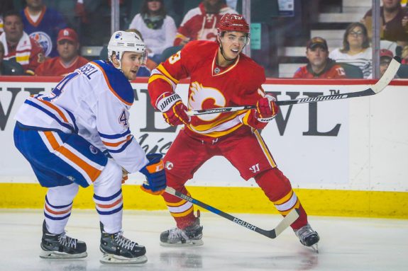 (Sergei Belski-USA TODAY Sports) Kris Russell, seen here keeping a close watch on Calgary Flames star Johnny Gaudreau during their season-opening Battle of Alberta, has been a pleasant surprise for the Edmonton Oilers in the early stages.