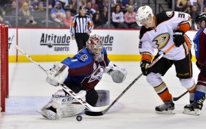 Apr 9, 2016; Denver, CO, USA; Anaheim Ducks left wing Jakob Silfverberg (33) attempts to score past Colorado Avalanche goalie Semyon Varlamov (1) in the third period at Pepsi Center. The Ducks defeated the Avalanche 5-3. Mandatory Credit: Ron Chenoy-USA TODAY Sports 