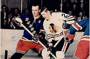 Harry Howell battled with Stan Mikita.