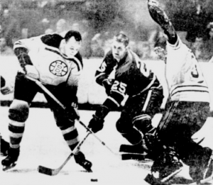 Bruins Al Langlois and Bernie Parent foil a chance by Leafs Orland Kurtenbach.