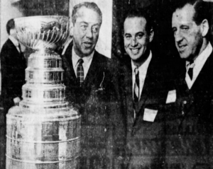 St. Louis Blues executives with the Stanley Cup