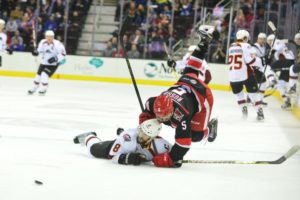 Aaron Palushaj (Cleveland Monsters) gets tangled up with Robbie Russo (Grand Rapids Griffins) photo credit : John Saraya