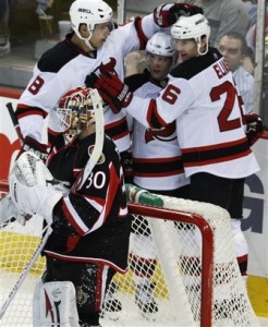 Brian Gionta (center) recorded 152 and 160 assists over the course of 473 games for the New Jersey Devils from 2001-2009. (AP Photo/The Canadian Press)
