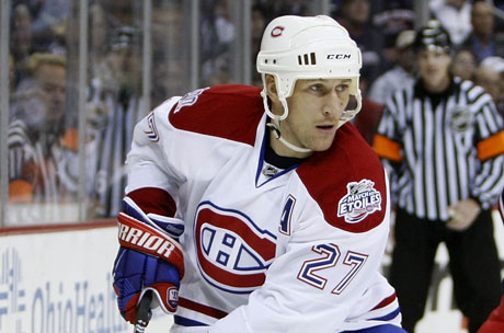 Montreal Canadiens right wing forward Alexei Kovalev (27) starts a play  from his own end against the New York Islanders in the third period at the  Bell Centre in Montreal, Canada on