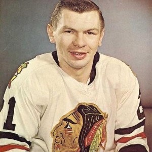 Stan Mikita - showed up referee John Ashley.