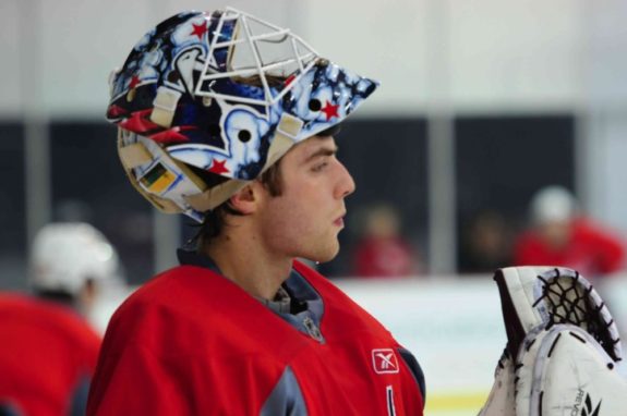 Hershey Bears goalie Braden Holtby (#1) takes a break during a