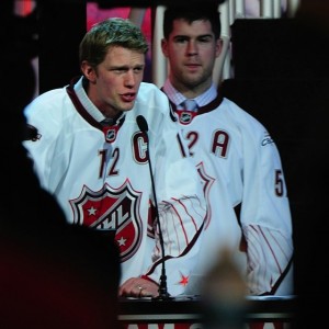 Captain Eric Staal takes Cam Ward with the first pick as Mike Green looks on (Tom Turk/THW)