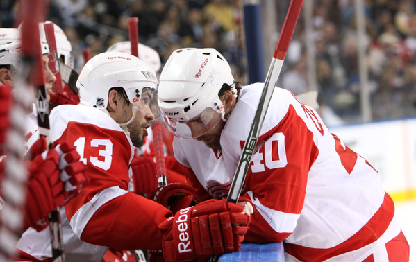 Darren Helm talks to center Henrik Zetterberg