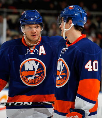 Kyle Okposo (left) and Michael Grabner