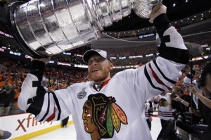 Hossa finally lifted the Stanley Cup in his third finals.  (AP Photo/Matt Slocum)