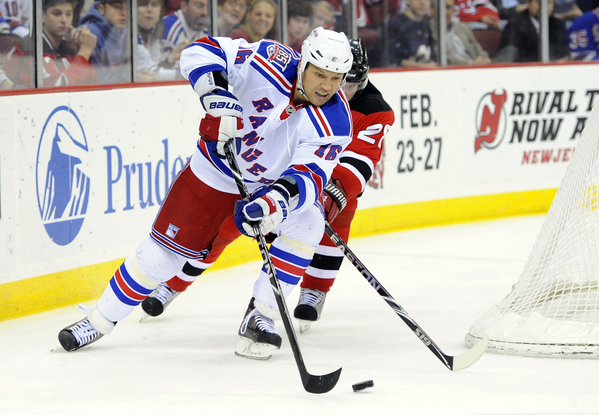 New York Rangers left wing Sean Avery, left, and New Jersey Devils