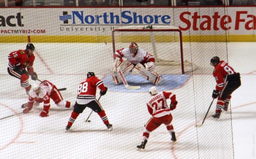 Patrick Kane and Marian Hossa rush the net