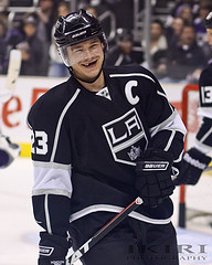 The la kings visiting players bench includes captain dustin brown