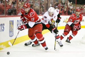 Carolina Hurricane Jiri Tlusty, Ottawa Senator Daniel Alfredsson - Photo by Andy Martin Jr