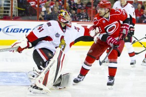 Ottawa Senator - Craig Anderson, Carolina Hurricane Patrick Dwyer - Photo by Andy Martin Jr