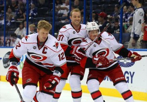 Eric Staal (12), Tim Brent (37) and Jeff Skinner Hurricanes