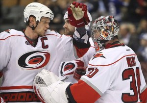 Cam Ward and Eric Staal (Tom Szczerbowski-US PRESSWIRE)