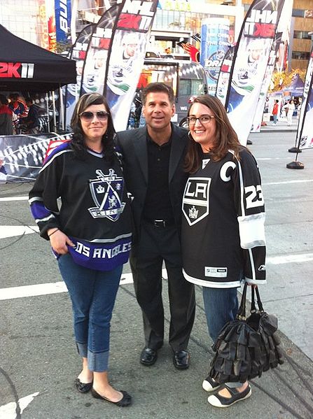 Fox, with two Kings fans in front of L.A. Live in Los Angeles. Credit: Harburrito (Own work) via Wikimedia Commons