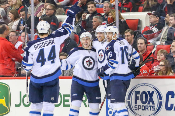 (Left->Right) Zach Bogosian (44) Bryan Little and Blake Wheeler all re-signed multi-year contracts with the Winnipeg Jets. - Photo By Andy Martin Jr