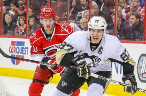 Pittsburgh Penguin SIDNEY CROSBY and Carolina Hurricane RILEY NASH - Photo by Andy Martin Jr