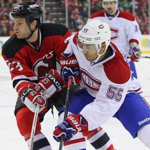 Montreal Canadiens defenseman Francis Bouillon and then-New Jersey Devils forward David Clarkson