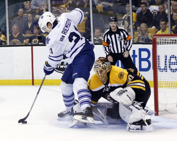 James van Riemsdyk fights for position in front of Boston's Tuukka Rask(Greg M. Cooper-USA TODAY Sports)