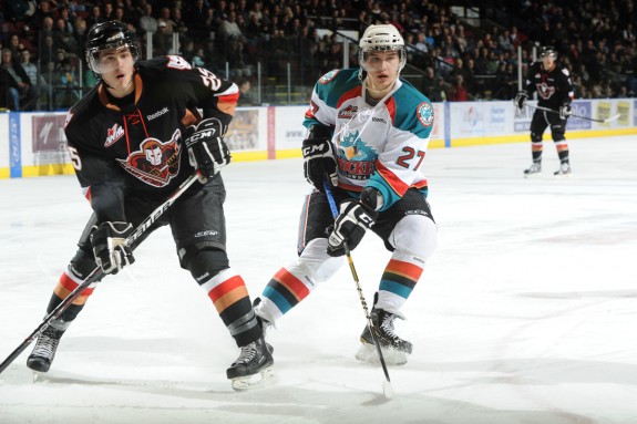 Greg Chase, left, of the Calgary Hitmen. (Shoot the Breeze Photography)