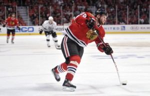 Bryan Bickell takes a shot during a game last season (Rob Grabowski-USA TODAY Sports)