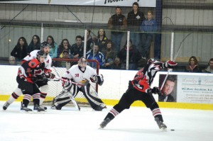 Mackenzie Weegar winds up from the point. One of his strengths is his shot from the blue line. (Darren Matte/The Hockey Writers)