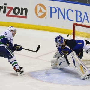 Derek Roy (pictured left) during his brief stint as a Vancouver Canuck during the 2012-13 season. (Scott Rovak-USA TODAY Sports)