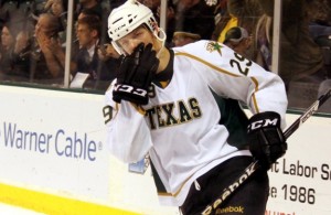 Chiasson removes his mouthguard after a successful shootout goal (Ross Bonander / THW)