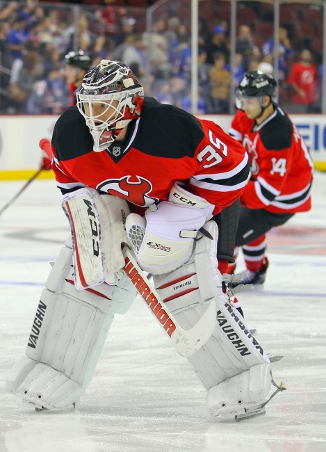 Cory Schneider is going to be wearing red & black for a long time.(Ed Mulholland-USA TODAY Sports)