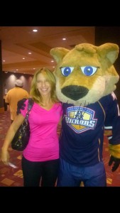 Becky with the Oklahoma City Barons mascot Derrick