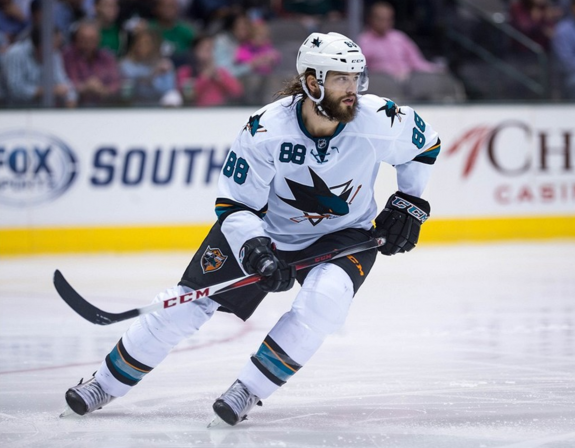 Oct 17, 2013; Dallas, TX, USA; San Jose Sharks right wing Brent Burns (88) skates against the Dallas Stars during the game at the American Airlines Center. The Stars defeated the Sharks 4-3 in the overtime shootout. Mandatory Credit: Jerome Miron-USA TODAY Sports