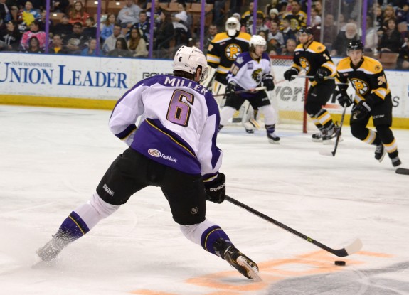 Manchester D Colin Miller looks for an open lane for a shot this past weekend against the Providence Bruins. (Josh Weinreb Photo)