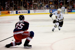 Dmitry Orlov fires a shot in an AHL game against the Hartford Wold Pack (Annie Erling Gofus/The Hockey Writers)