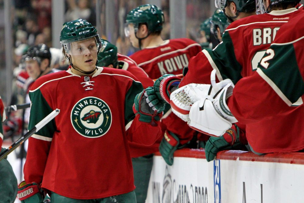 Minnesota Wild's Clayton Stoner, left, and goalie Niklas Backstrom of  Finland is shown in the first period of an NHL hockey game against the San  Jose Sharks Saturday, March 23, 2013, in